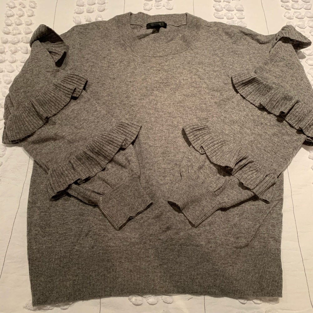 Ruffled sleeve wool sweater